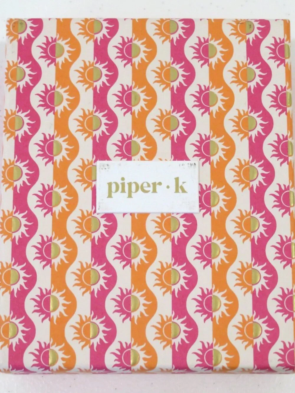 Piper K gold tone